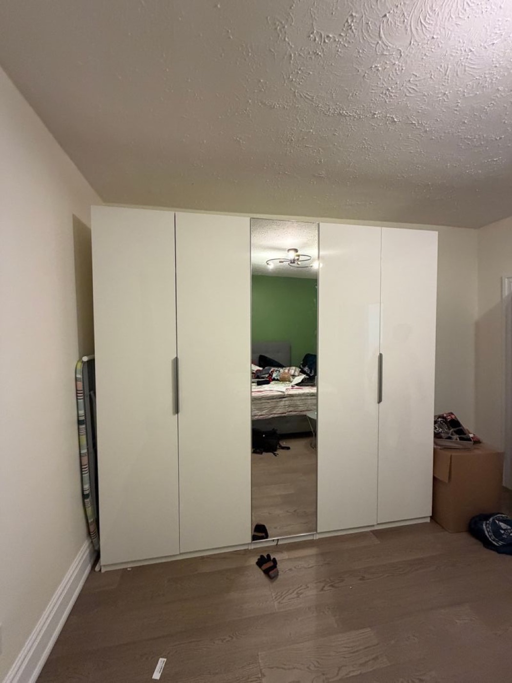 IKEA wardrobe assembled in a Toronto condo bedroom