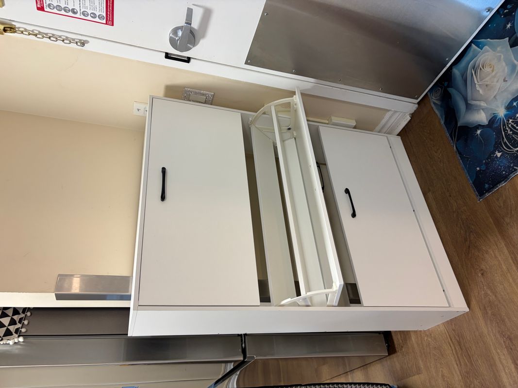 Dresser assembly in condo bedroom